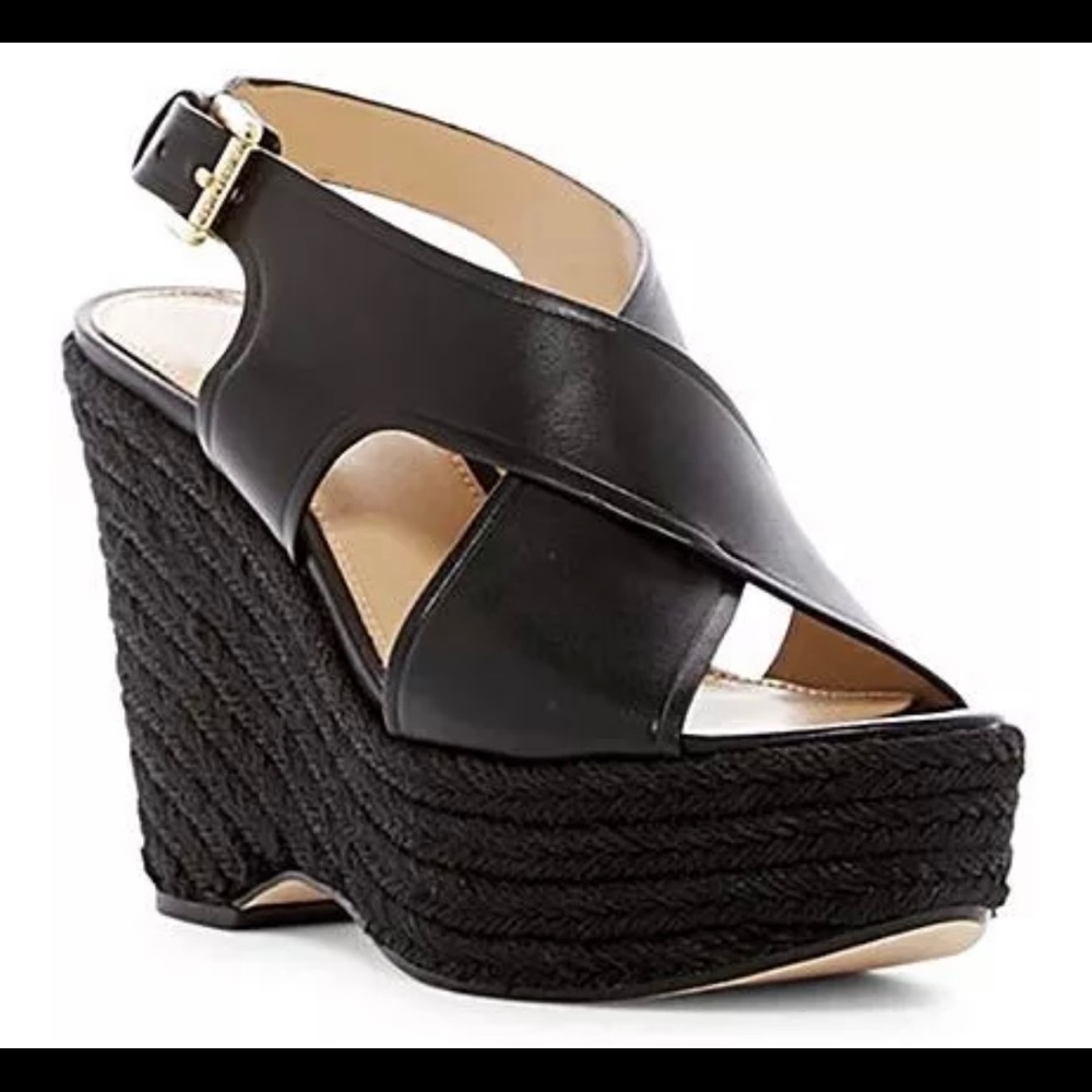 MICHAEL Michael Kors Angeline Wedge sandals.
Size 6 1/2. Used once indoors